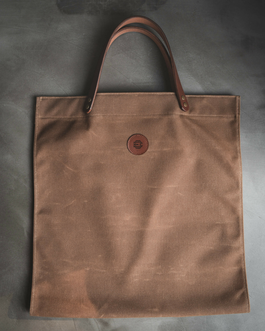 Tan waxed canvas Firewood carrier tote bag with leather handles