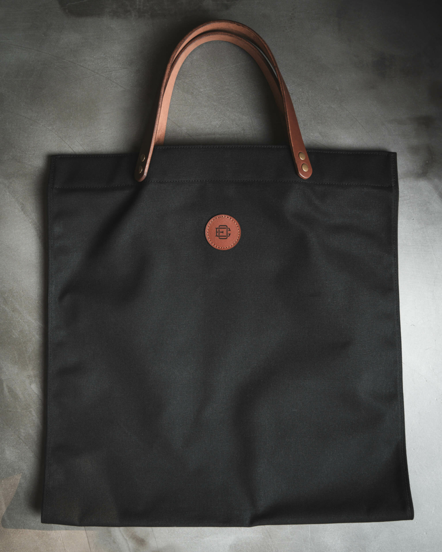 Black waxed canvas Firewood carrier tote bag with leather handles