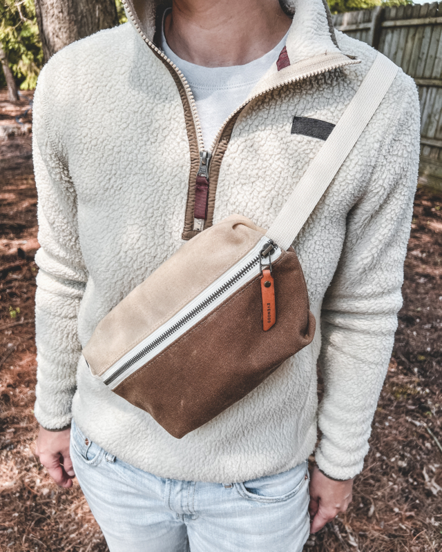 sling bag in natural waxed canvas and tan canvas with leather accents