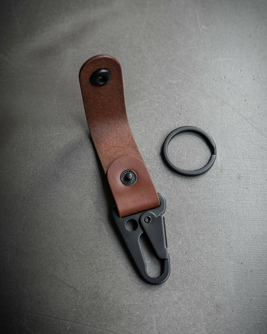 Full grain brown leather keychain with heavy duty matte black clip