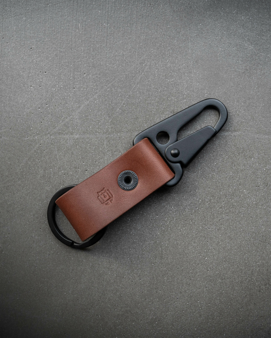 Full grain brown leather keychain with heavy duty matte black clip