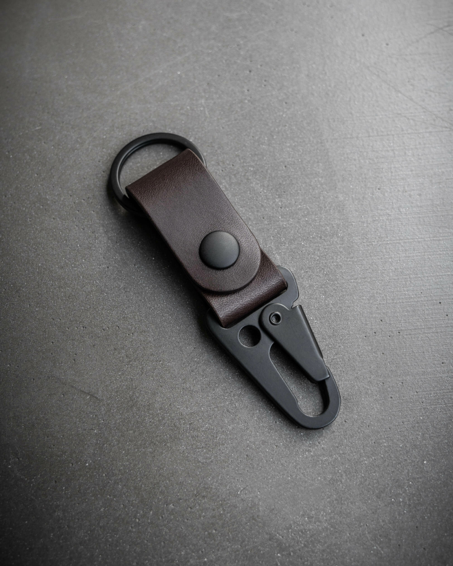 Full grain dark brown leather keychain with heavy duty matte black clip