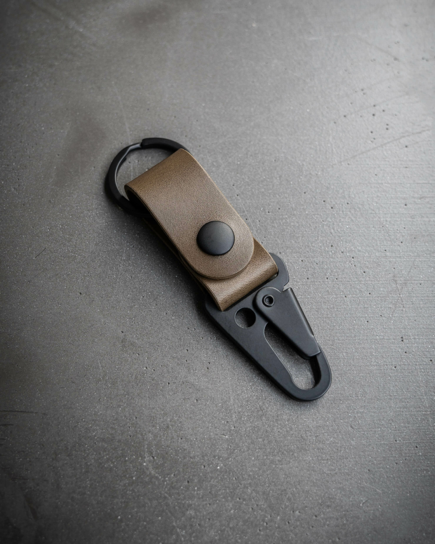 Full grain olive leather keychain with heavy duty matte black clip