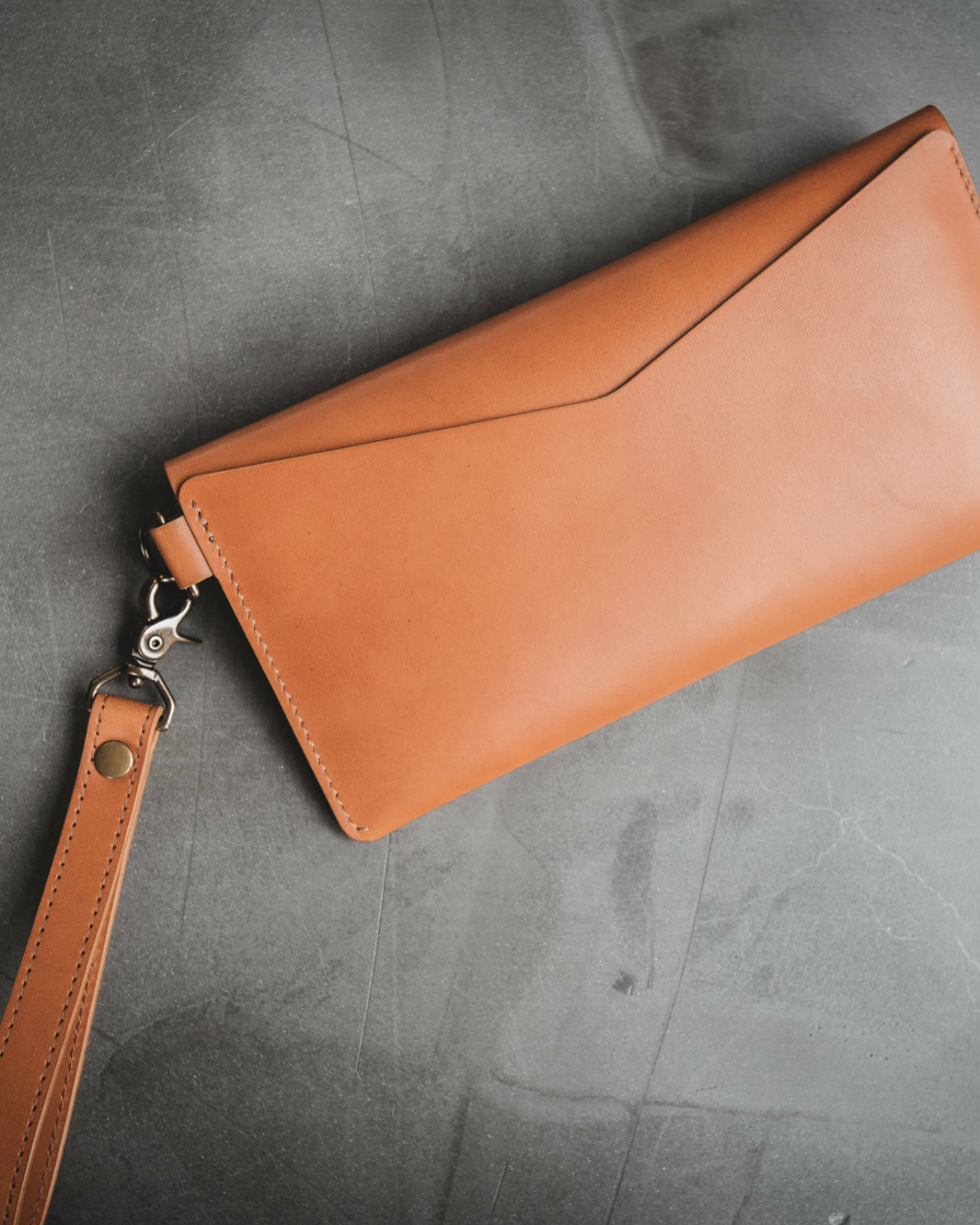 Back Pocket Leather Wristlet Envelope Clutch in Tan