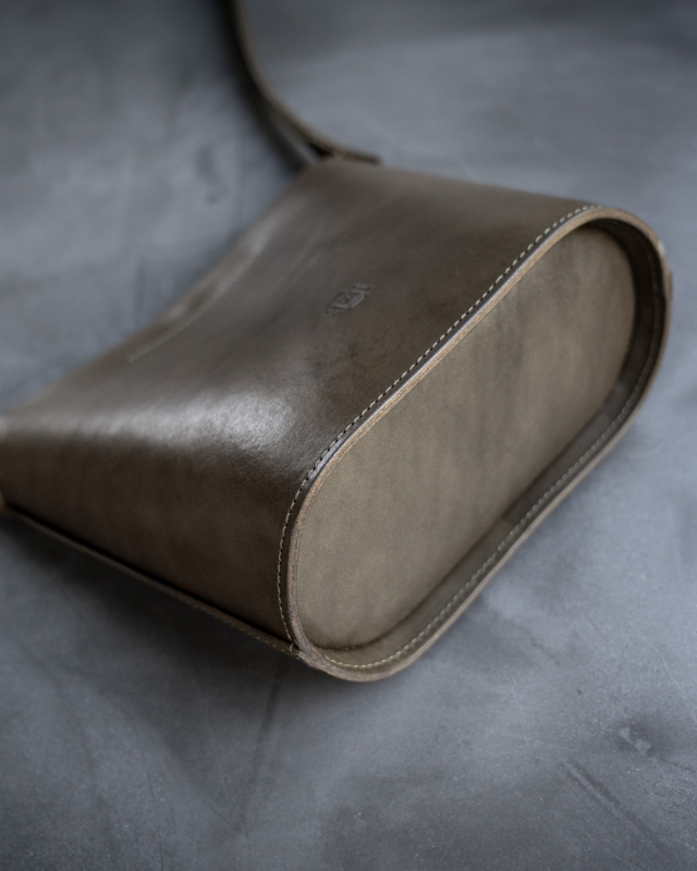 Olive leather bucket bag bottom view