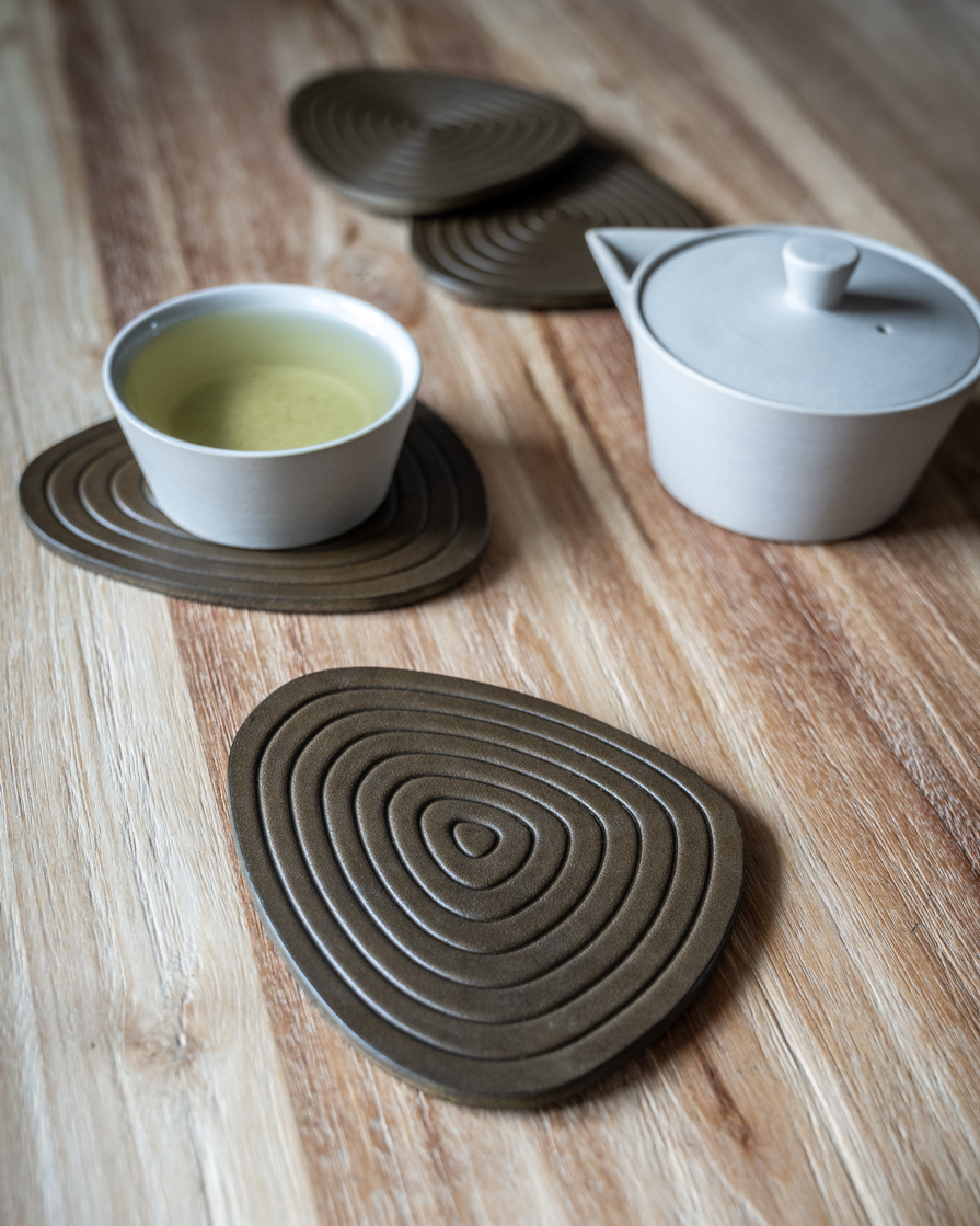 Zen rock garden coaster in olive leather
